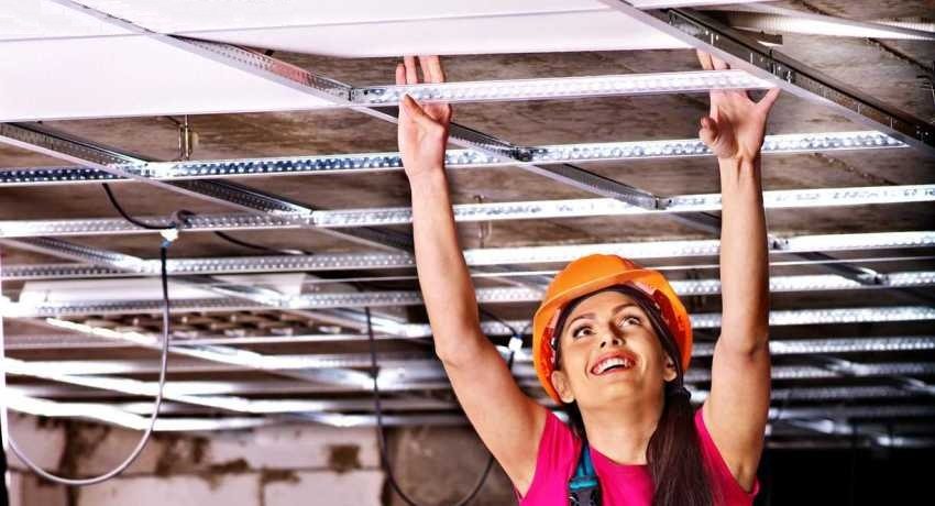 Plasterboard sheets are attached to the frame made of metal profiles Plasterboard sheets are attached to the frame made of metal profiles