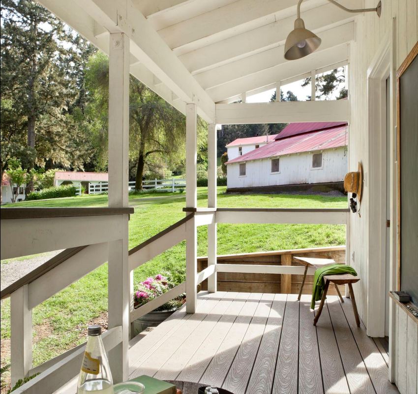 Porch of a wooden house with a visor Porch of a wooden house with a visor
