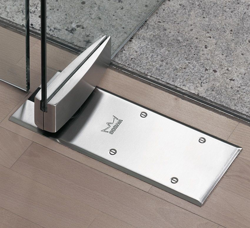 Nedre hængsel af glasdør udstyret med gulvfjeder Nedre hængsel af glasdør udstyret med gulvfjeder