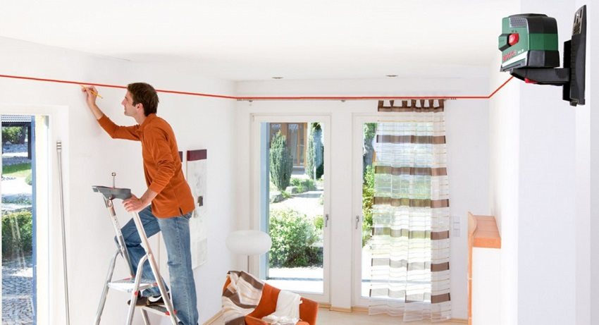 Nivelul laserului este foarte convenabil de utilizat la marcarea înălțimii tavanului Nivelul laserului este foarte convenabil de utilizat la marcarea înălțimii tavanului