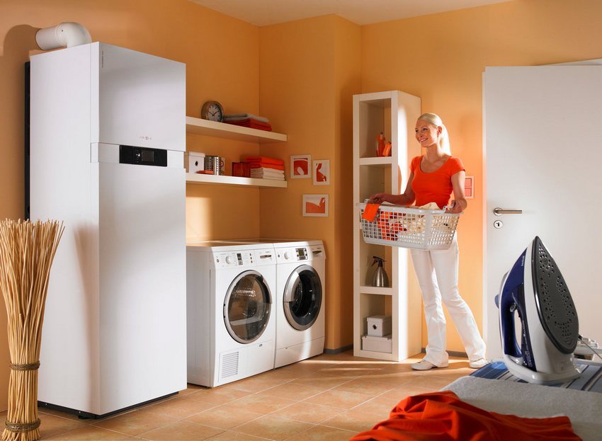 Floor standing gas boiler fits harmoniously into the interior of the room Floor standing gas boiler fits harmoniously into the interior of the room