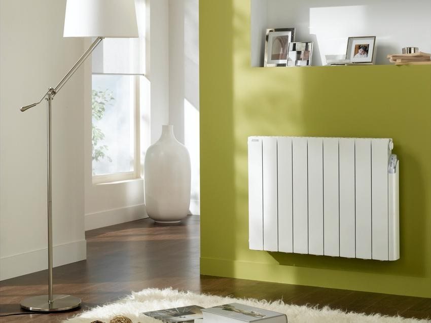 The compact convector silently heats the air in the room The compact convector silently heats the air in the room