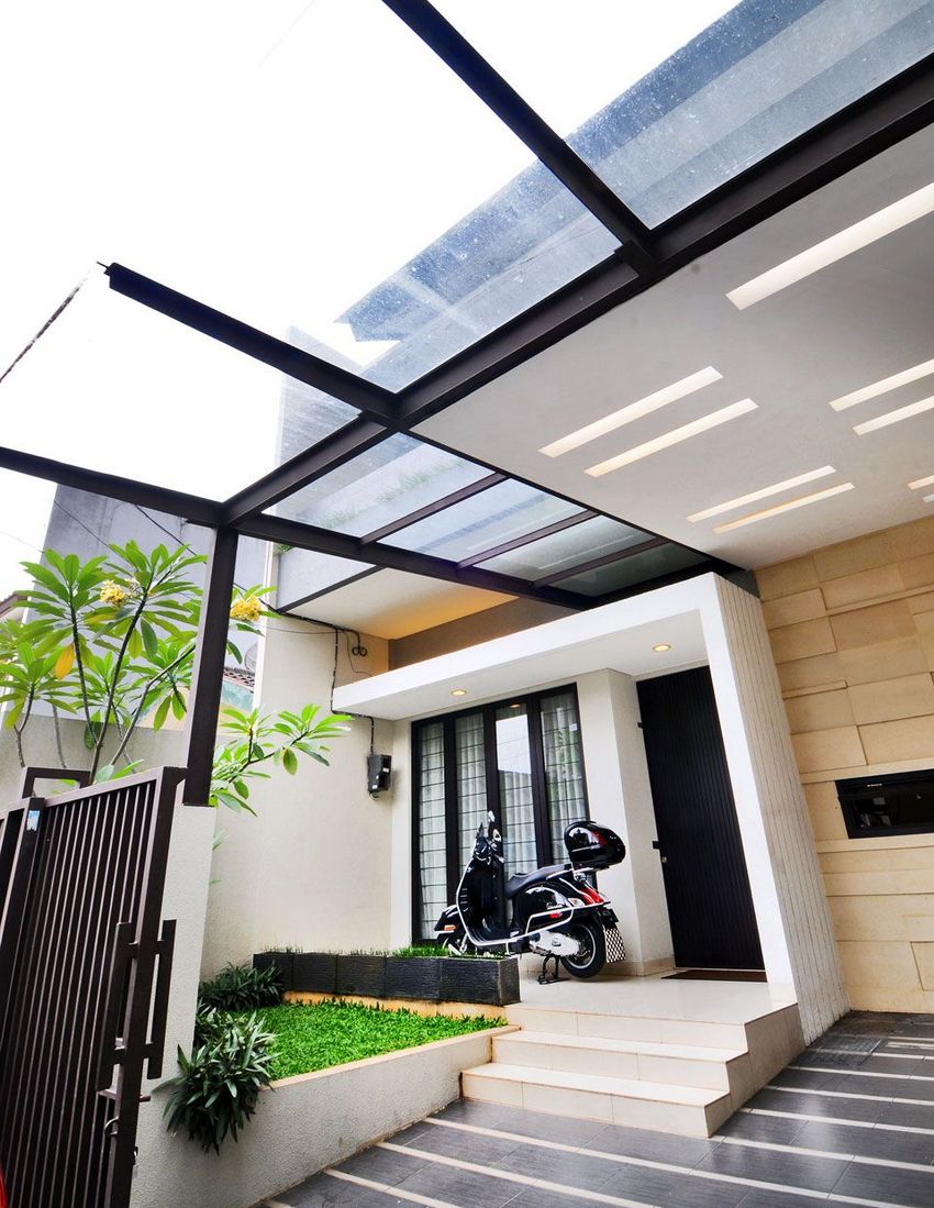 Solution moderne d'un auvent fixé au mur de la maison Solution moderne d'un auvent fixé au mur de la maison