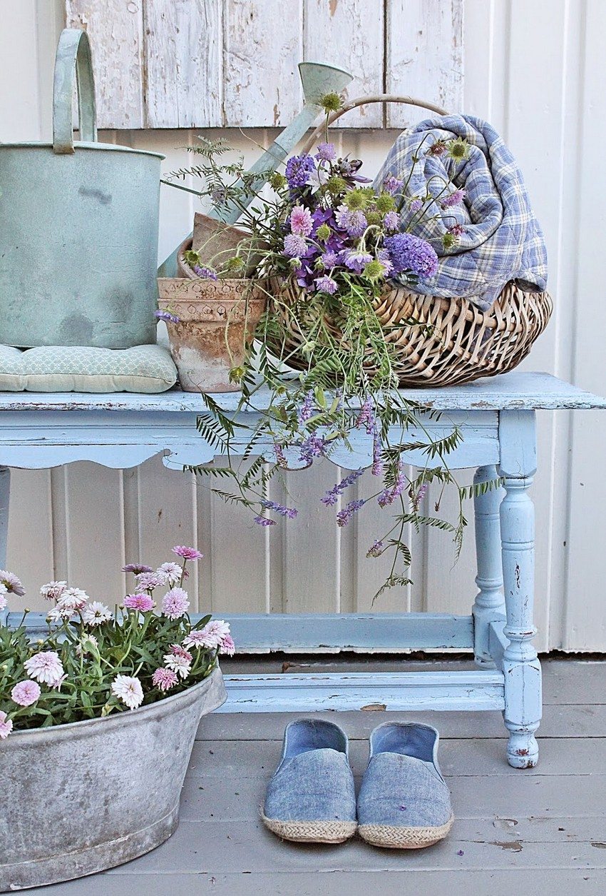 Wooden bench located on the veranda of a private house Wooden bench located on the veranda of a private house