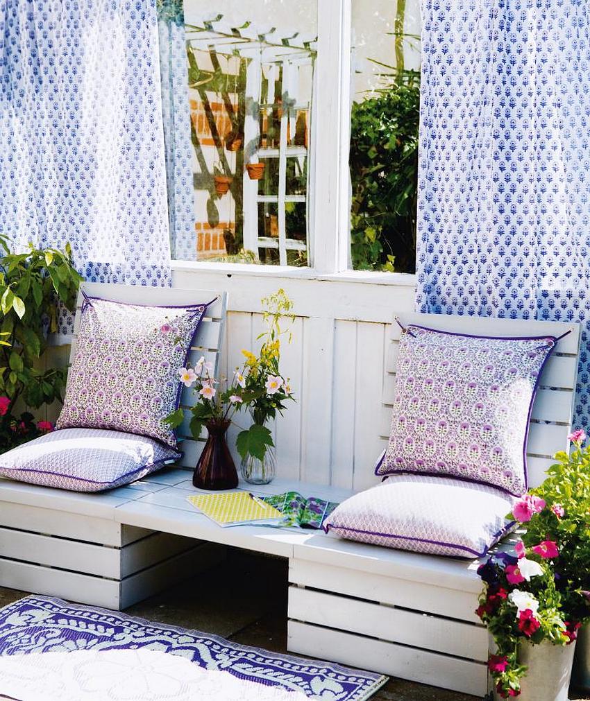 An original wooden bench with a table designed for two people An original wooden bench with a table designed for two people