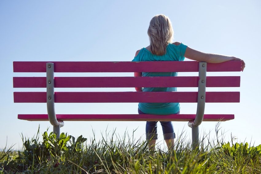 An example of a wooden bench with a metal frame An example of a wooden bench with a metal frame