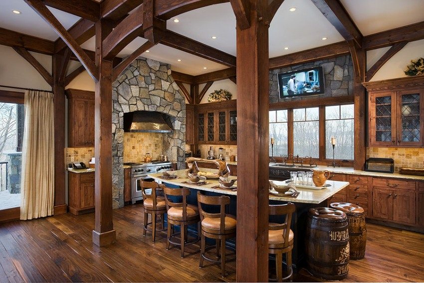 אזור הכיריים במטבח מרופד באבן ומסוגנן כאח אזור הכיריים במטבח מרופד באבן ומסוגנן כאח