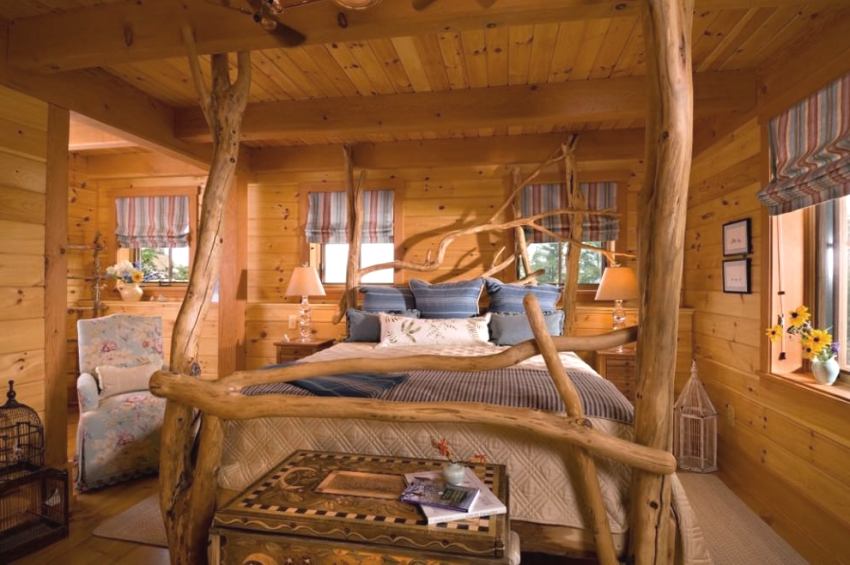 חדר השינה עשוי בסגנון בקתה רוסית חדר השינה עשוי בסגנון בקתה רוסית