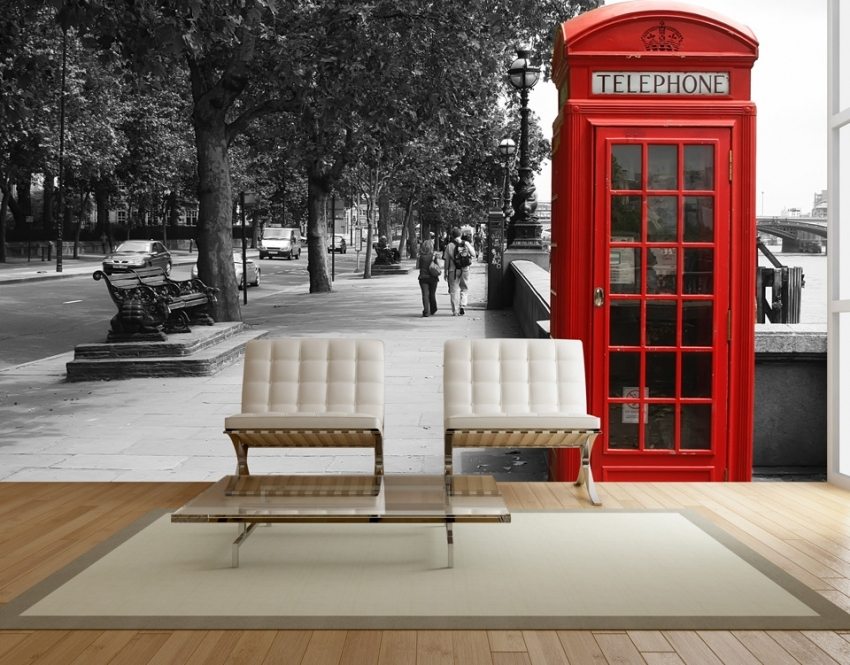 Originaltrykket av en bygate på veggen i interiøret Originaltrykket av en bygate på veggen i interiøret