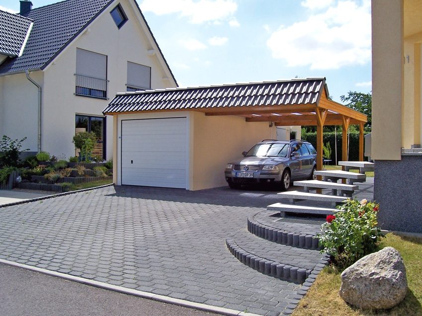 Cửa nhà để xe bằng thép con lăn cho một chiếc xe hơi Cửa nhà để xe bằng thép con lăn cho một chiếc xe hơi