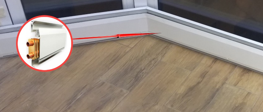 Warme Fußleiste - ideal für die Installation in einem Raum mit Panoramafenstern Warme Fußleiste - ideal für die Installation in einem Raum mit Panoramafenstern