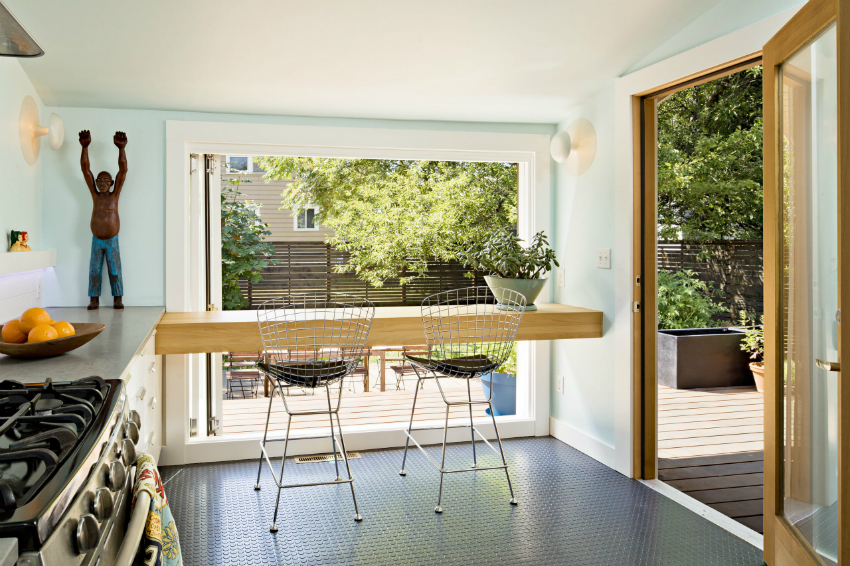 Takket være store panoramavinduer kan du lage en unik og uvanlig kjøkkendesign Takket være store panoramavinduer kan du lage en unik og uvanlig kjøkkendesign