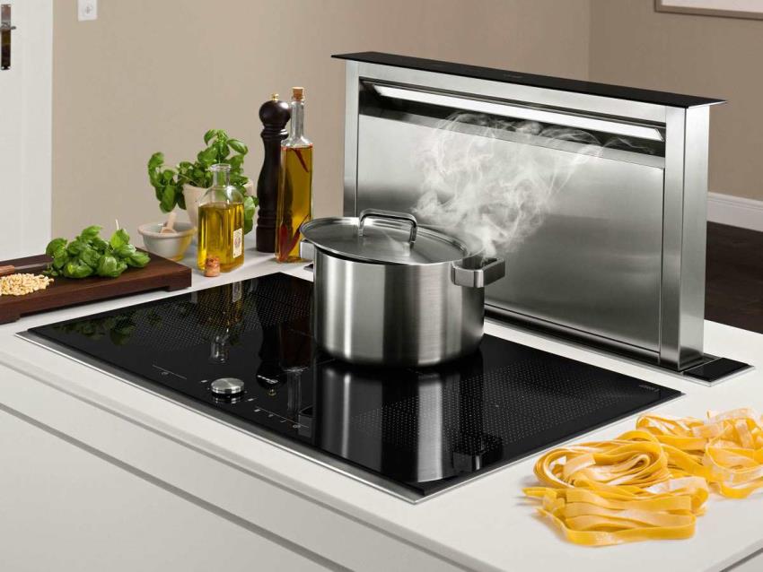 מכסה המנוע השולחן מותקן במשטח ליד הכיריים וניתן לשלוף אותו רק במהלך הבישול מכסה המנוע השולחן מותקן במשטח ליד הכיריים וניתן לשלוף אותו רק במהלך הבישול