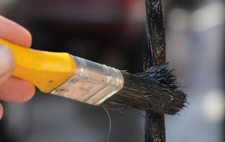 Utvendig metallmaling av rust og bruk