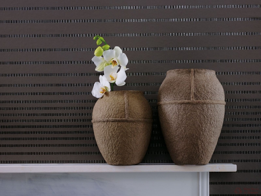 Tykt vinyltapet vil bidra til å maskere alle feil på veggoverflaten Tykt vinyltapet vil bidra til å maskere alle feil på veggoverflaten