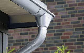 Metalni krovni oluci: cijene, karakteristike i značajke ugradnje