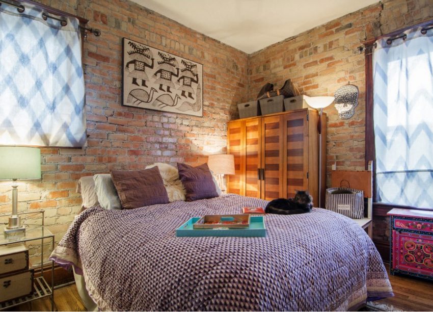 Stilfuld soveværelse indretning med murstensvægge Stilfuld soveværelse indretning med murstensvægge