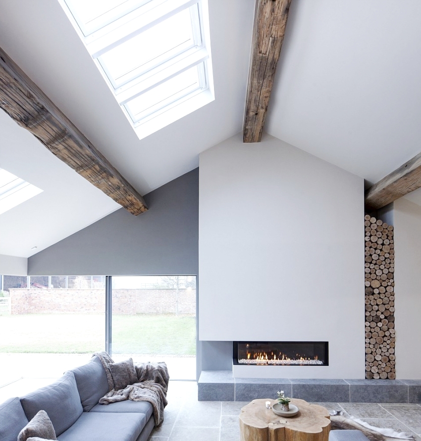 Isang halimbawa ng paggamit ng isang fireplace bilang isang pangunahing tuldik sa isang silid ng Art Nouveau Isang halimbawa ng paggamit ng isang fireplace bilang isang pangunahing tuldik sa isang silid ng Art Nouveau