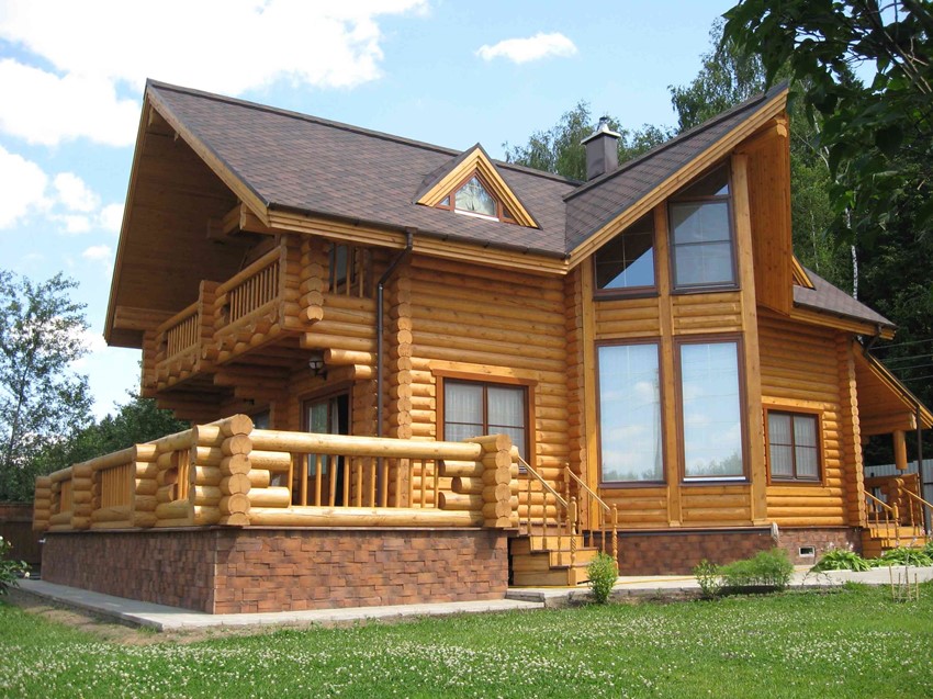 For the construction of a country house with a bay window, you can use natural timber For the construction of a country house with a bay window, you can use natural timber