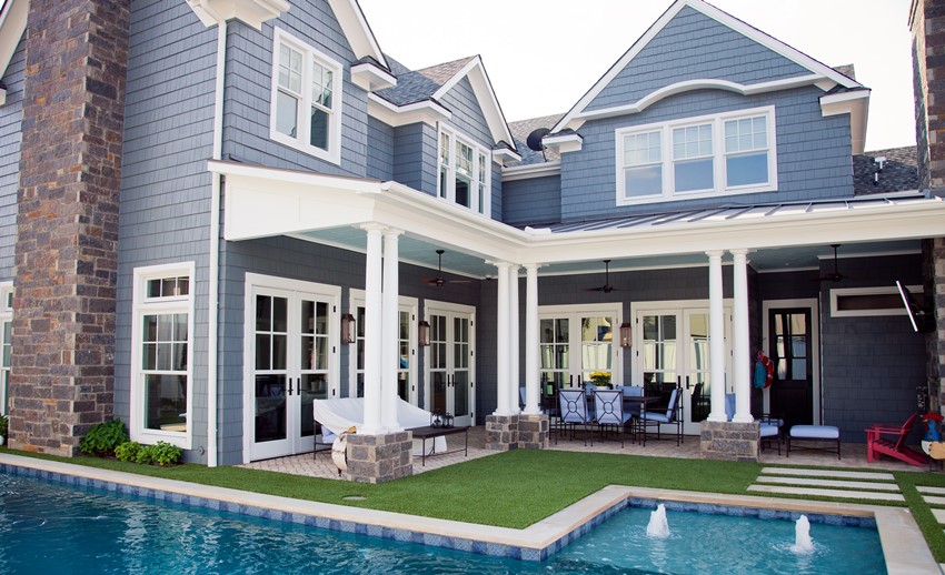 The general style of decoration of the roofs of the house and the bay window creates a harmonious architectural ensemble The general style of decoration of the roofs of the house and the bay window creates a harmonious architectural ensemble