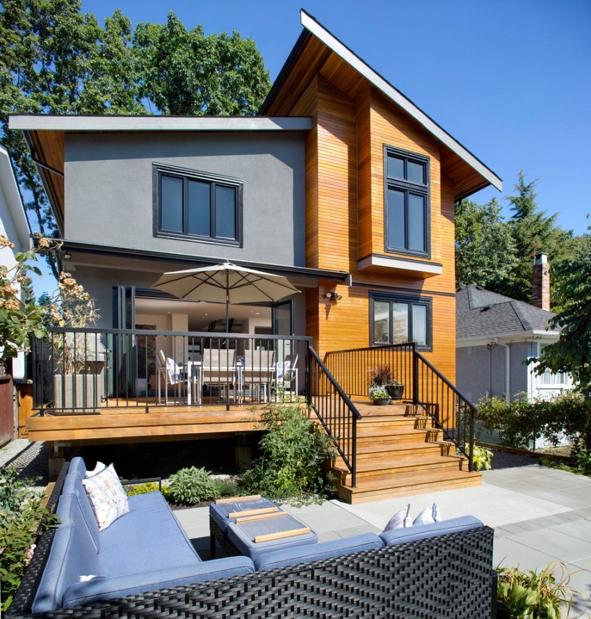 Modern two-storey house with bay window and attic Modern two-storey house with bay window and attic