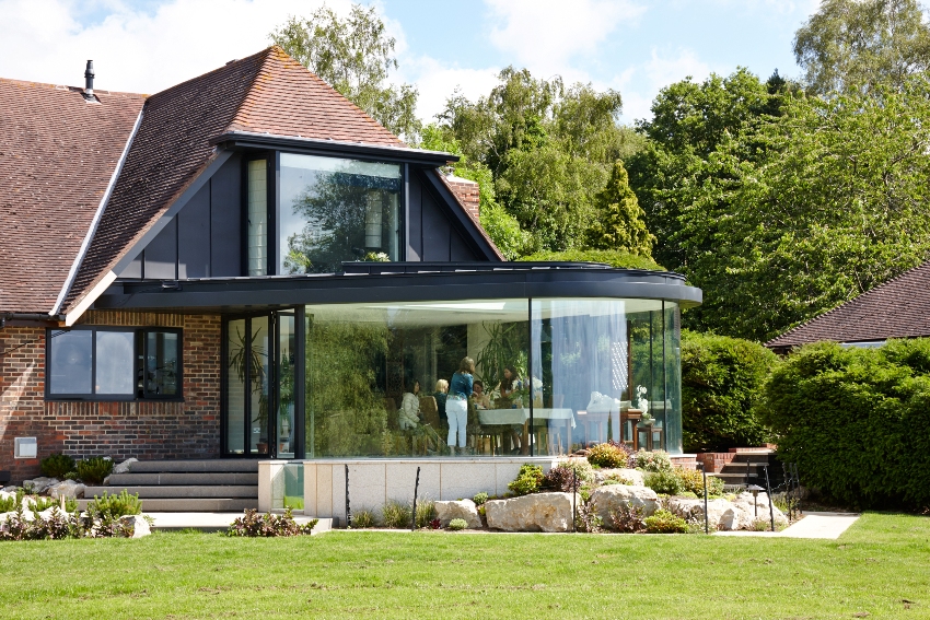 House with an elegant glass bay window House with an elegant glass bay window