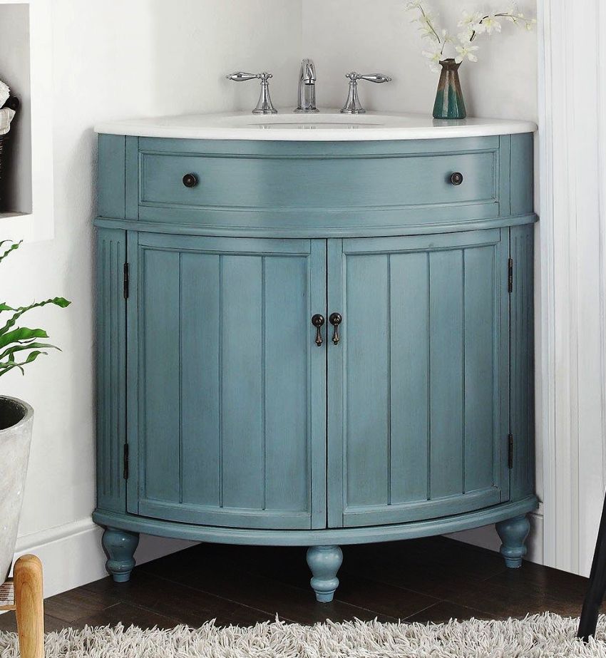 For all corner pedestals, the common thing is the absence of a straight back wall of the case, it is replaced by the sidewalls brought together at an angle of 45 ° For all corner pedestals, the common thing is the absence of a straight back wall of the case, it is replaced by the sidewalls brought together at an angle of 45 °