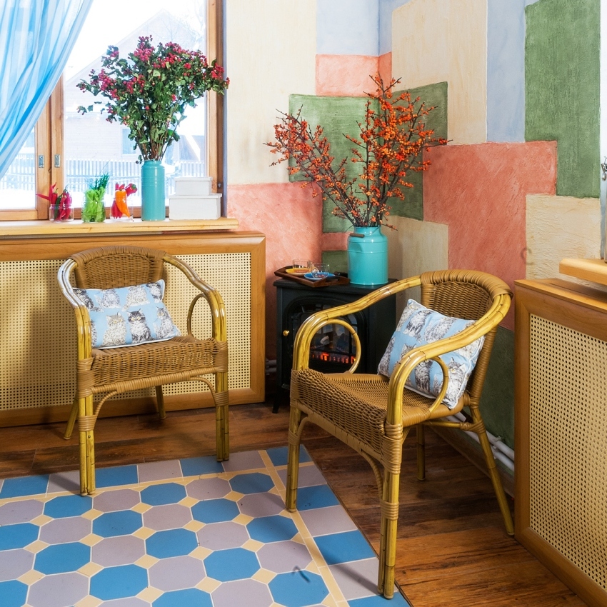 The screen for a heating radiator made of MDF is made of perforated panels, which are framed by a frame made of the same material. The screen for a heating radiator made of MDF is made of perforated panels, which are framed by a frame made of the same material.