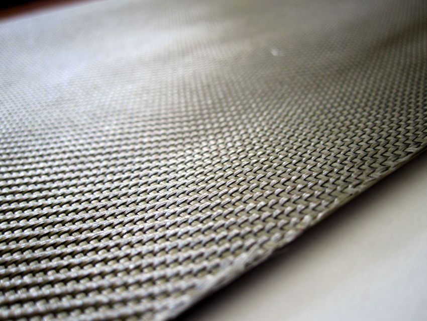 Glassfibermateriale som brukes til å lage tapet Glassfibermateriale som brukes til å lage tapet