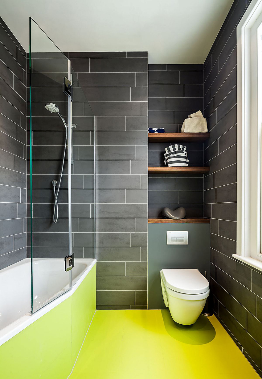 En glasskærm er fantastisk til at opdele et delt badeværelse i zoner En glasskærm er fantastisk til at opdele et delt badeværelse i zoner