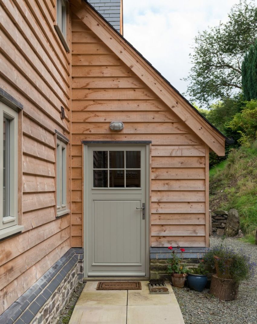 Para sa isang proyekto kung saan ang bahay ay pinagsama sa isang paligo, isang layout sa anyo ng titik G ay perpekto Para sa isang proyekto kung saan ang bahay ay pinagsama sa isang paligo, isang layout sa anyo ng titik G ay perpekto