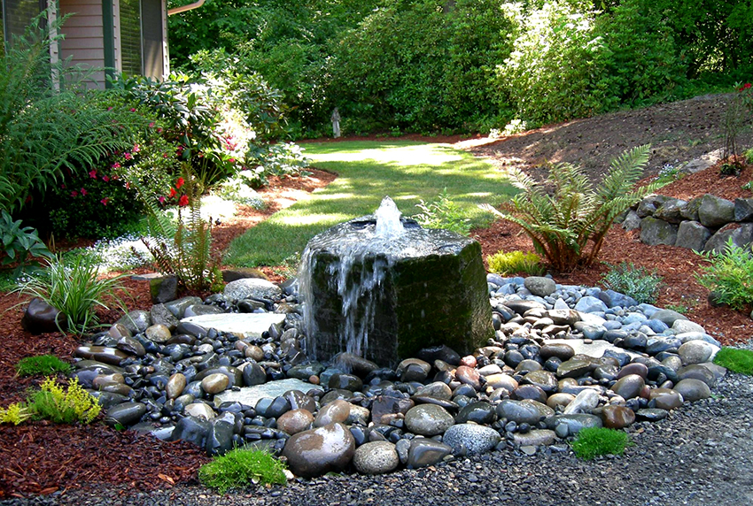 On a small summer cottage, a stone mini-fountain will look good On a small summer cottage, a stone mini-fountain will look good