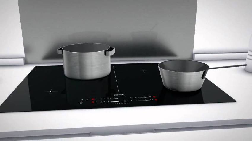 Qualsevol superfície de la placa d’inducció té la capacitat d’ajustar contínuament el nivell de potència Qualsevol superfície de la placa d’inducció té la capacitat d’ajustar contínuament el nivell de potència