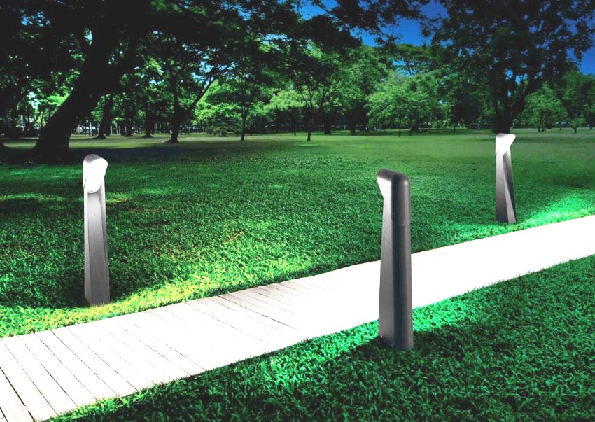 Stolper designet for å feste lamper på gaten er laget av forskjellige materialer Stolper designet for å feste lamper på gaten er laget av forskjellige materialer