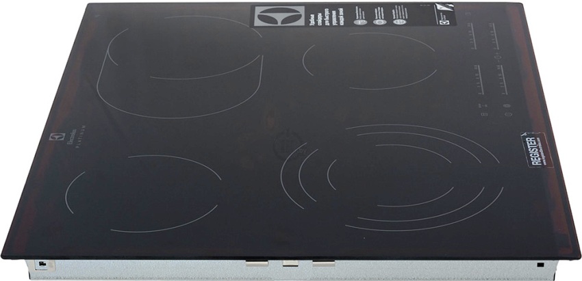 O modelo da placa Electrolux EHF96547FK tem uma superfície de vitrocerâmica preta e bordas chanfradas ao longo de todo o perímetro O modelo da placa Electrolux EHF96547FK tem uma superfície de vitrocerâmica preta e bordas chanfradas ao longo de todo o perímetro