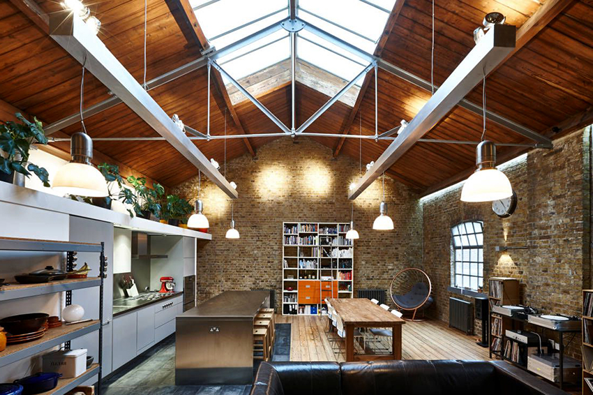 אין להעמיס בחדר בסגנון לופט המשלב מטבח וסלון בעיצוב וריהוט מיותרים אין להעמיס בחדר בסגנון לופט המשלב מטבח וסלון בעיצוב וריהוט מיותרים