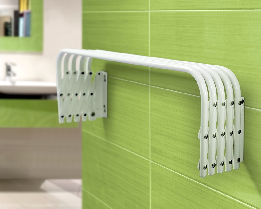 Akordeónové sušičky sa dajú ľahko zasunúť, takže sú prakticky neviditeľné Akordeónové sušičky sa dajú ľahko zasunúť, takže sú prakticky neviditeľné