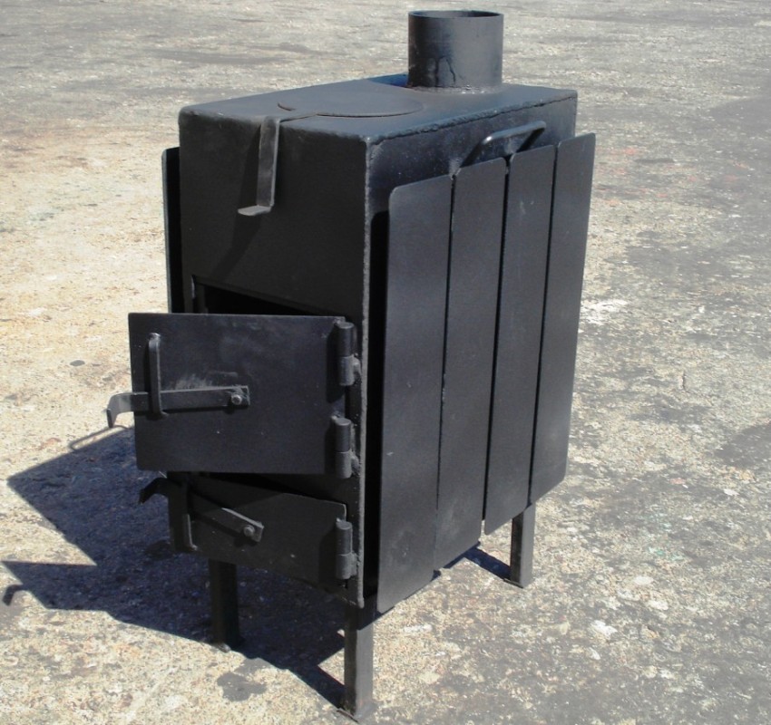 Opvarmning af en garage med en maveovn er en af de mest almindelige opvarmningsmetoder Opvarmning af en garage med en maveovn er en af de mest almindelige opvarmningsmetoder