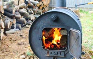 Komfur fra en tønde: en simpel mulighed for at organisere opvarmning i bryggers