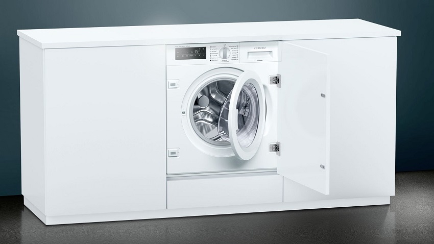 Máquina de lavar embutida Siemens WI 14 W 540 tem uma velocidade de centrifugação de 1400 rpm Máquina de lavar embutida Siemens WI 14 W 540 tem uma velocidade de centrifugação de 1400 rpm