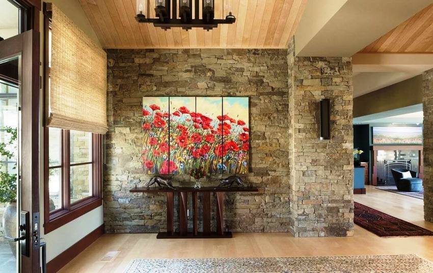 Ang dekorasyon ng mga pader ng koridor na may artipisyal na bato ay mukhang orihinal Ang dekorasyon ng mga pader ng koridor na may artipisyal na bato ay mukhang orihinal