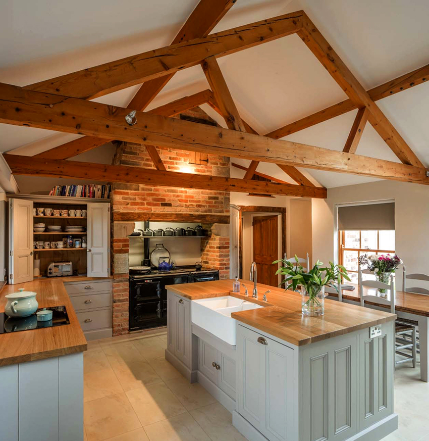 วัสดุที่ได้รับความนิยมมากที่สุดสำหรับการตกแต่งห้องครัวในชนบทคือไม้และหิน วัสดุที่ได้รับความนิยมมากที่สุดสำหรับการตกแต่งห้องครัวในชนบทคือไม้และหิน