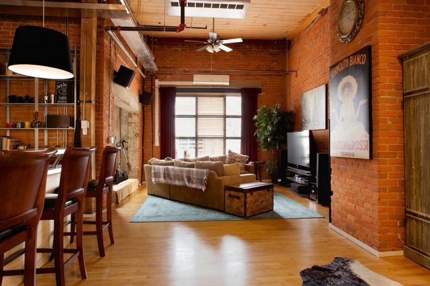 Ein kostengünstiges und praktisches Laminat ist als Bodenbelag für ein Wohnzimmer beliebt. Ein kostengünstiges und praktisches Laminat ist als Bodenbelag für ein Wohnzimmer beliebt.