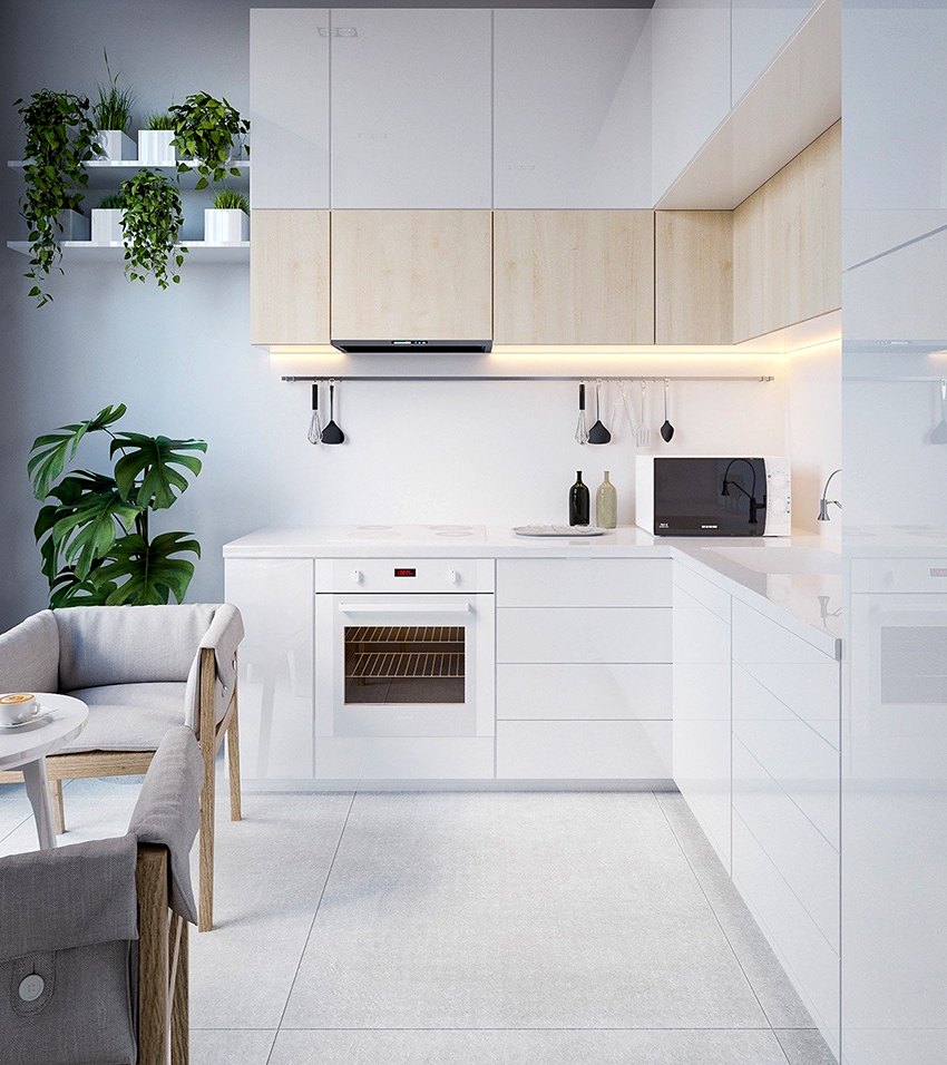 การตกแต่งภายในที่ทันสมัยของห้องครัวมากขึ้นผ้ากันเปื้อนจะเสร็จสิ้นด้วยแผงปิดผิว การตกแต่งภายในที่ทันสมัยของห้องครัวมากขึ้นผ้ากันเปื้อนจะเสร็จสิ้นด้วยแผงปิดผิว