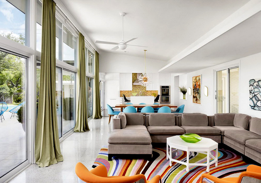 W przypadku dużych i panoramicznych okien zaleca się wybieranie wydłużonych zasłon W przypadku dużych i panoramicznych okien zaleca się wybieranie wydłużonych zasłon