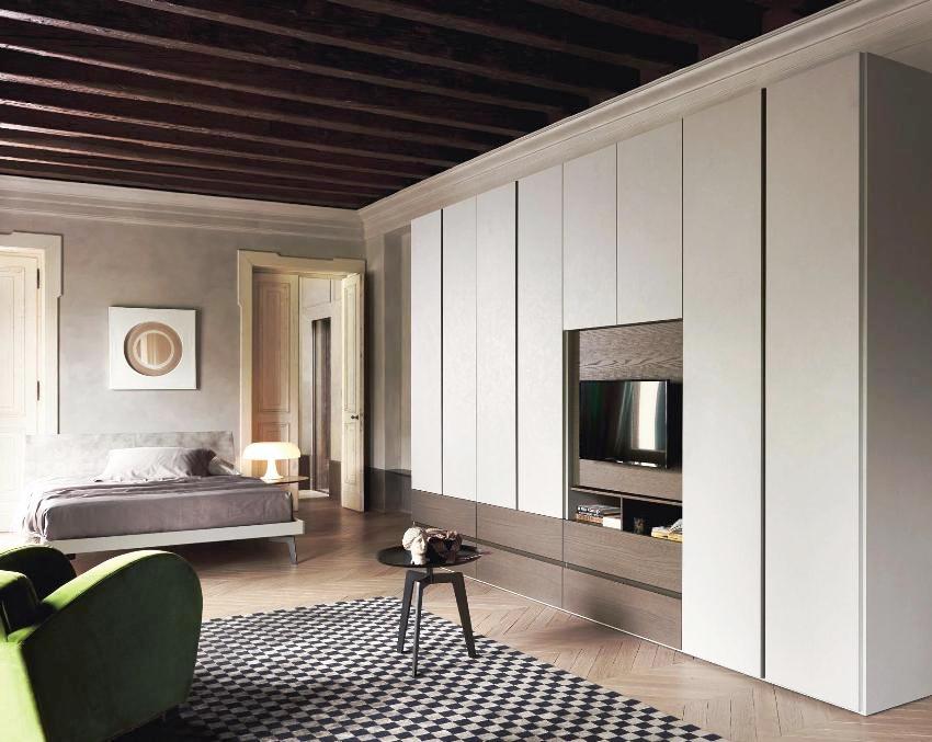 Ang mga tuwid na linya at monochromatic facade ay ang batayan ng minimalist na pader Ang mga tuwid na linya at monochromatic facade ay ang batayan ng minimalist na pader