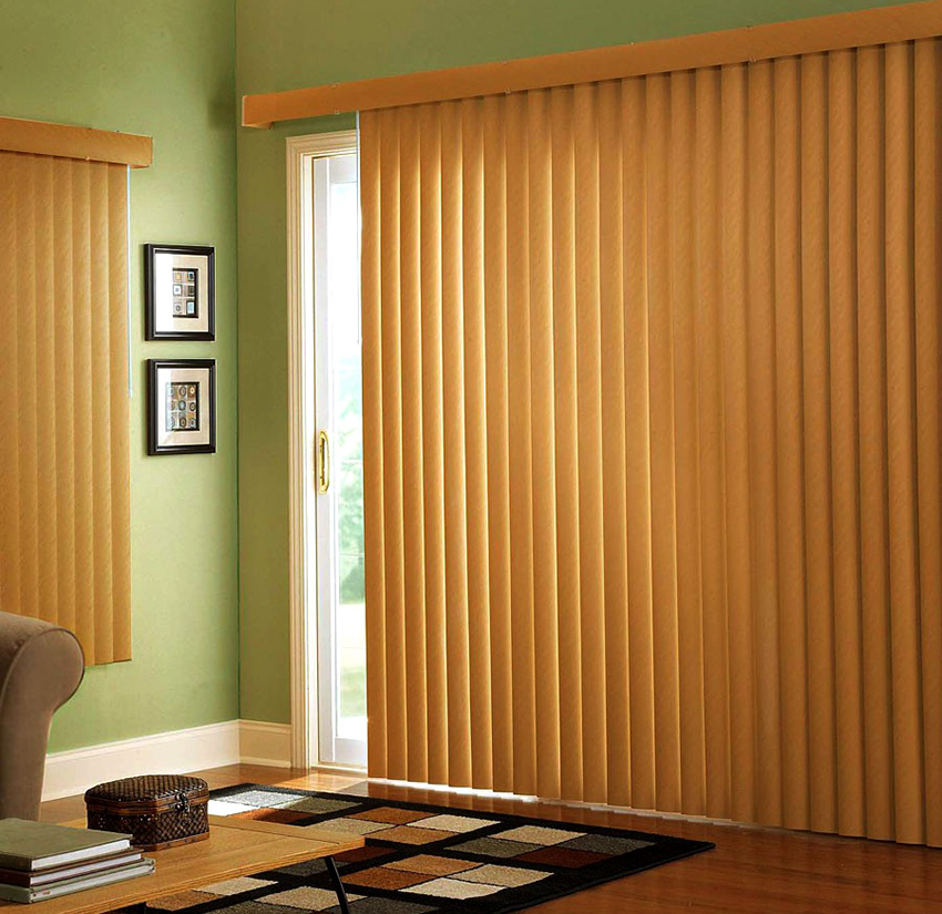 Vertical blinds made of wood are attached to the wall or ceiling Wooden vertical blinds are fixed to the wall or ceiling