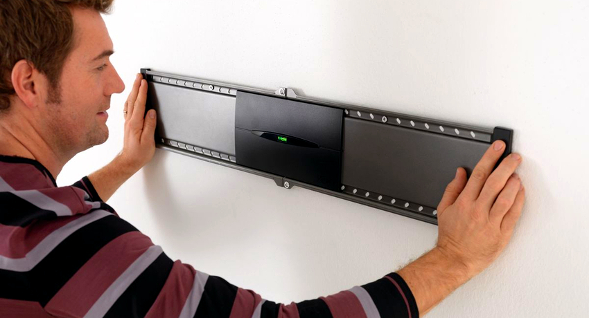 Upang ligtas at ligtas na ayusin ang TV sa isang pader o kisame, kailangan mong gumamit ng isang espesyal na bundok TV Mount: Pagpili ng Mga Maaasahang Mga Bracket at Pinakamahusay na Mga Pamamaraan sa Pag-mount