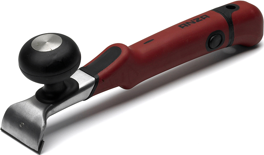 El raspat manual de parquet es realitza mitjançant una eina especial: un cicle El raspat manual de parquet es realitza mitjançant una eina especial: un cicle